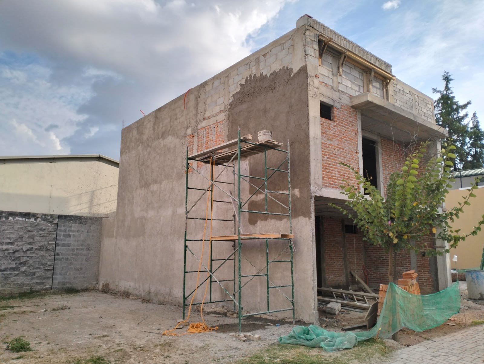 Fachada en obra gris, aplanado exterior